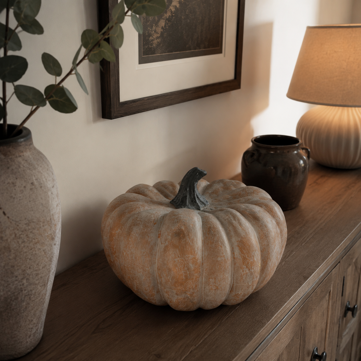 Corner scene — ceramic Halloween pumpkin styled into a quiet corner